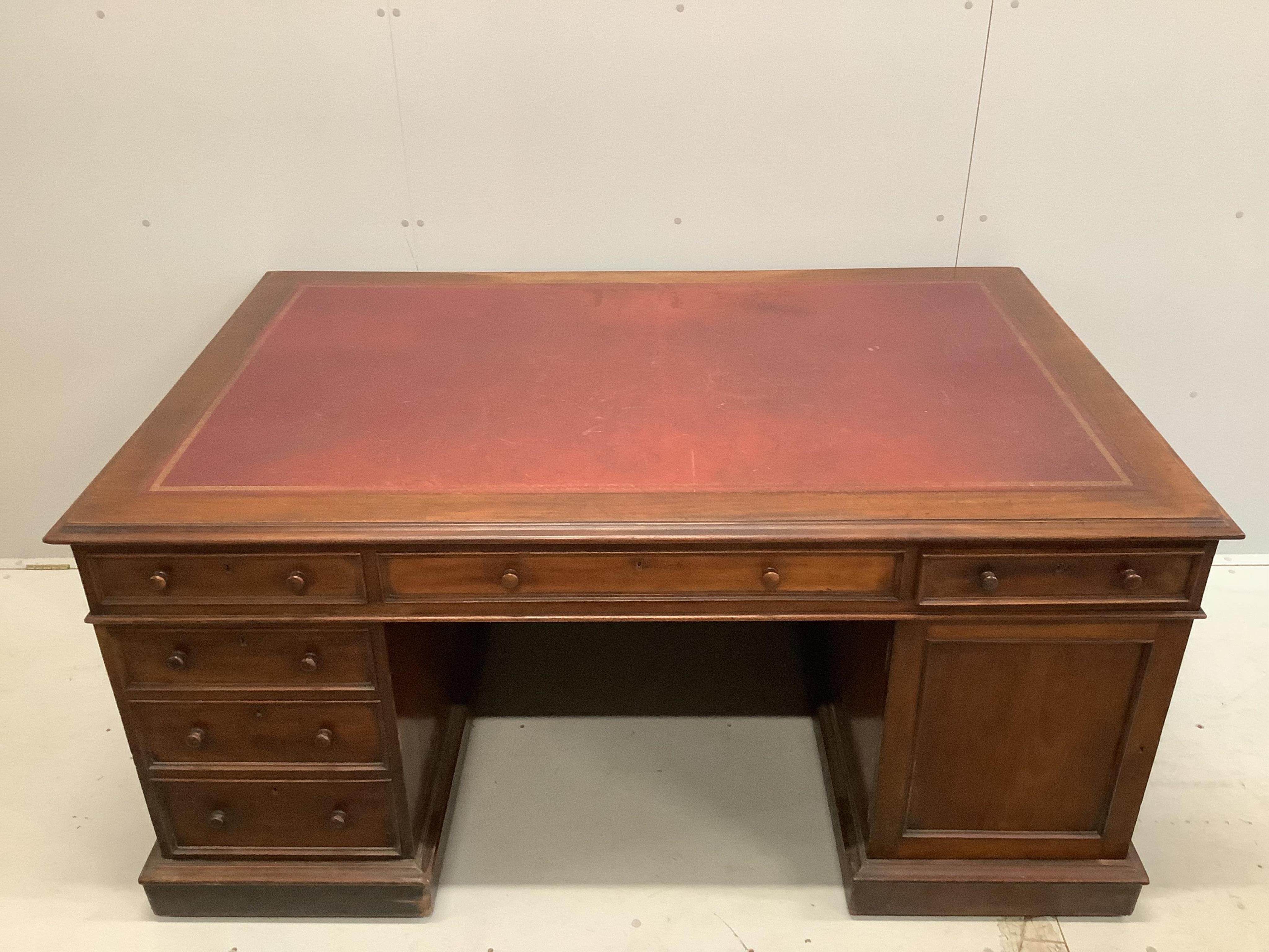 A Victorian mahogany pedestal partner's desk, width 168cm, depth 110cm, height 80cm. Condition - fair